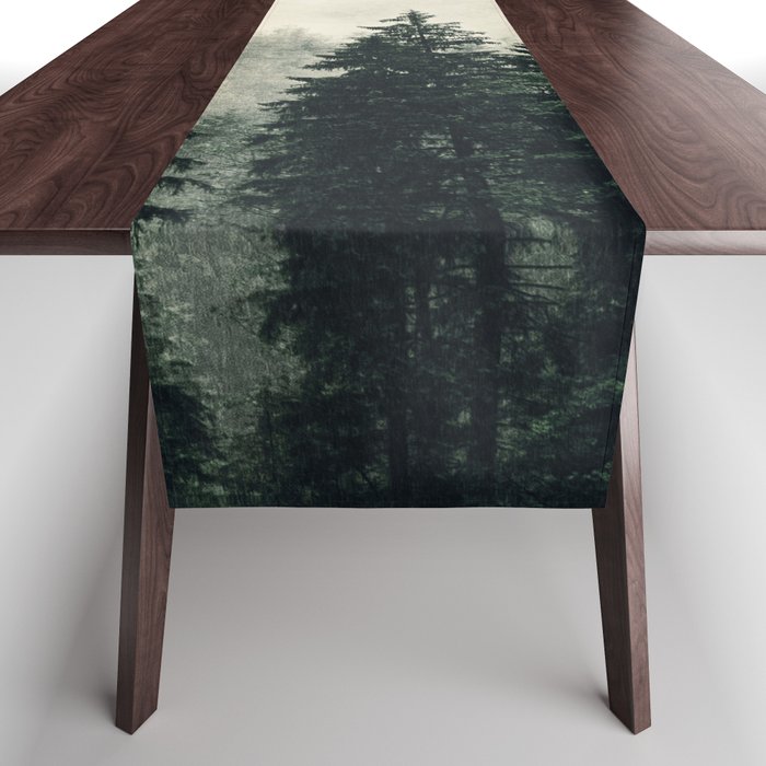 Thick pine forest in the descending mist Table Runner