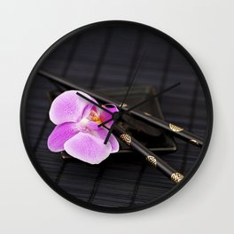 Zen pink Orchid flower on black Wall Clock