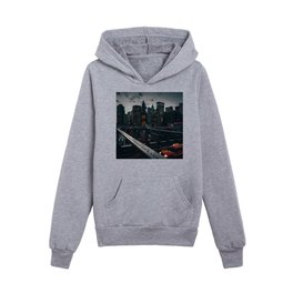 New York City Manhattan Skyline and Brooklyn Bridge with a yellow taxi at sunset Kids Pullover Hoodies