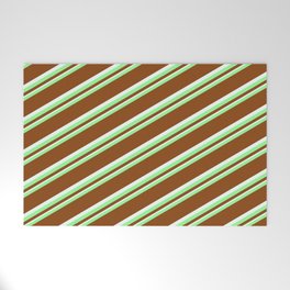 [ Thumbnail: Green, Brown & Mint Cream Colored Lines Pattern Welcome Mat ]