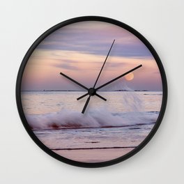 Reaching for the moon Wall Clock