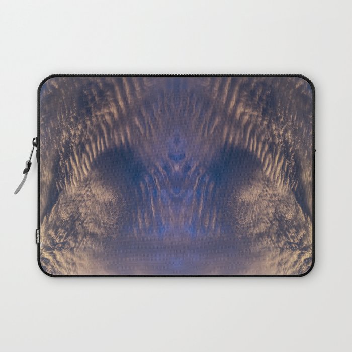 Bronze colored clouds in the dark blue sky Laptop Sleeve