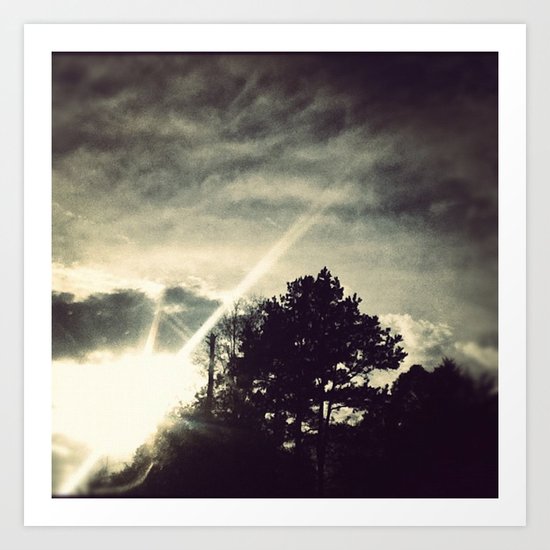 Sun setting threw the trees. Art Print