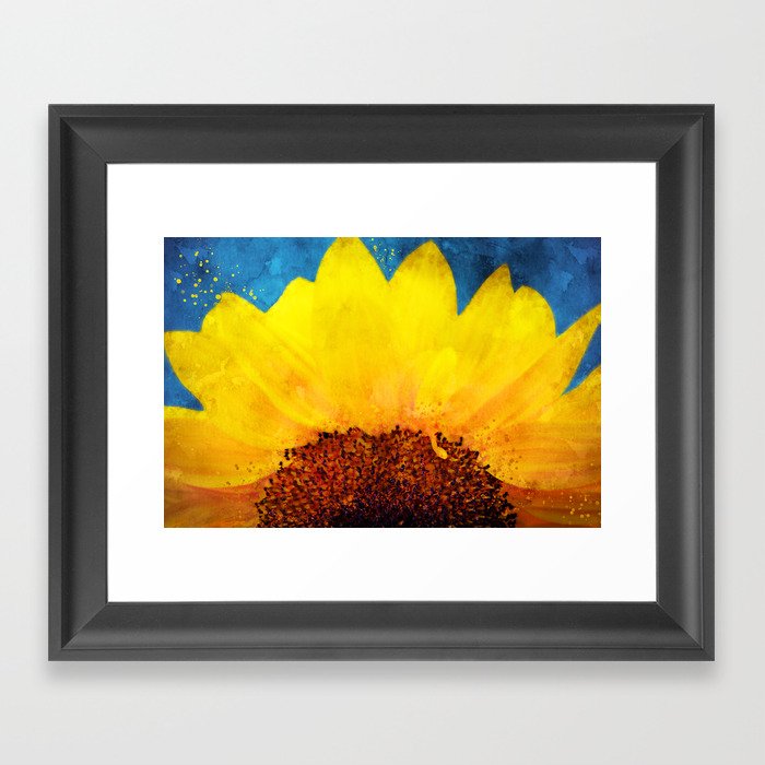 Partial sunflower on blue background Framed Art Print
