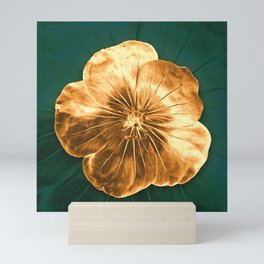 Golden flower on green Mini Art Print