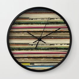 Old record carton covers stacked in pile Wall Clock
