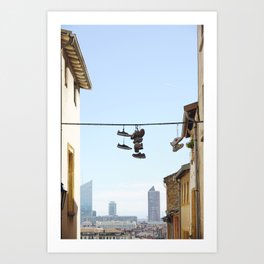 Elevated Expressions: Lyon's Stunning Skyline and Playful Shoe Tossing Delight from Above Art Print