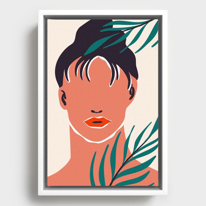 Beautiful woman face portrait with tropical nature leaf Framed Canvas