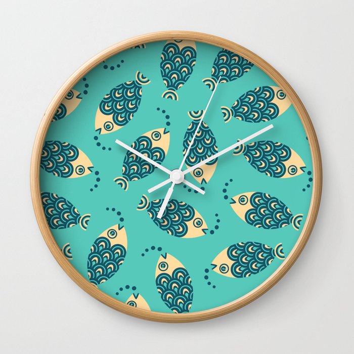 TOSSED SWIMMING FISH in COASTAL BLUE AND CREAM ON TURQUOISE Wall Clock