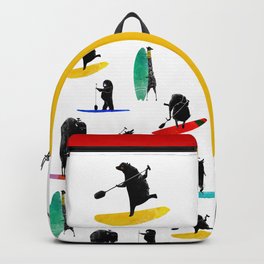 Paddling Bear loves his paddle board and surfing in the ocean. Backpack