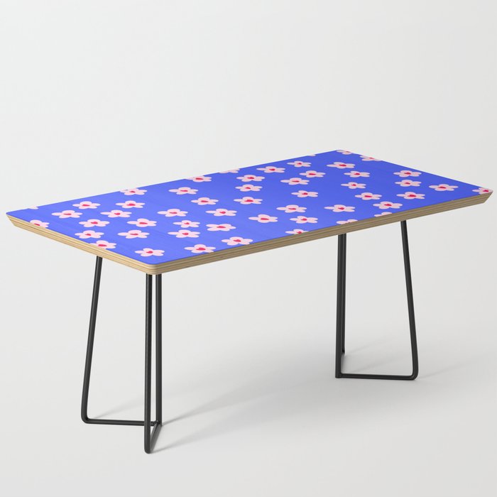 Cute Flowers with Hearts on Vibrant Blue Coffee Table