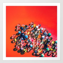 Marbles on vibrant red Art Print