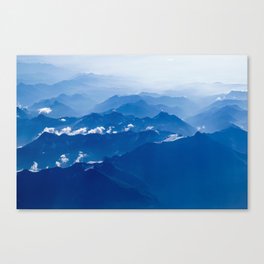 AERIAL PHOTOGRAPHY OF MOUNTAIN UNDER CLEAR BLUE SKY Canvas Print