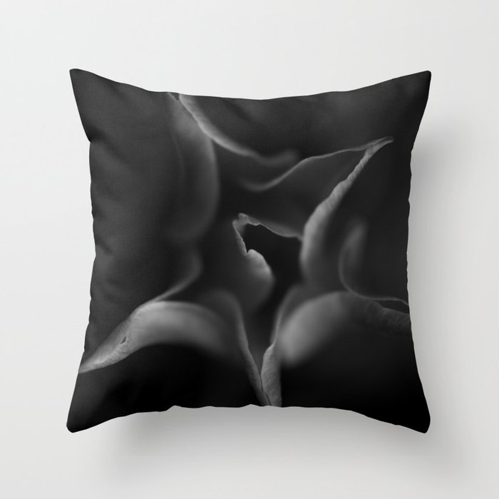 A Close-up of a Black and White Tulip Throw Pillow