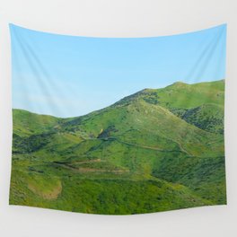 green field and green mountain with blue sky Wall Tapestry