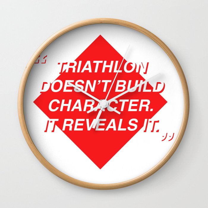 Triathlon doesn't build character. It reveals it Wall Clock