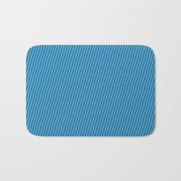 [ Thumbnail: Cornflower Blue & Teal Colored Lined Pattern Bath Mat ]