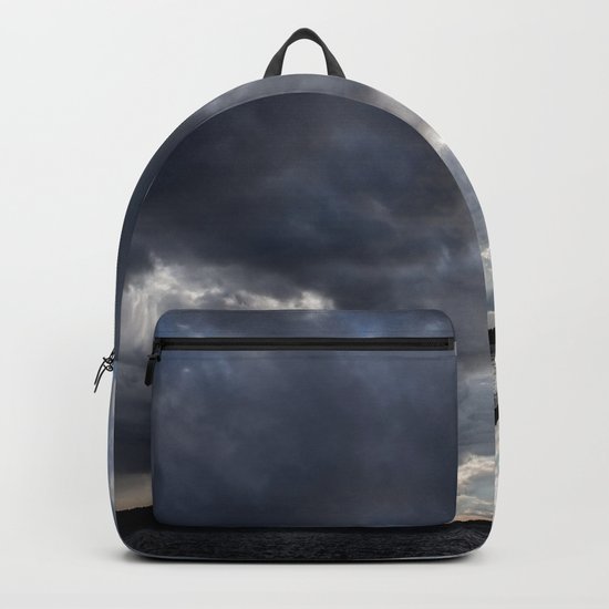 Dark Clouds Coming Over Lake In Scandinavia Backpack