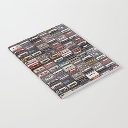 Huge collection of audio cassettes. Retro musical background Notebook