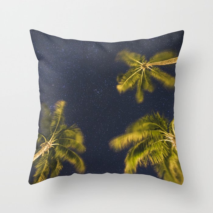 Palm trees at night against starry sky Throw Pillow