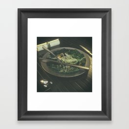 WEST eats EAST Framed Art Print