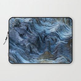 Detail of a rock with variants of blue. Rock full of curves and smooth cuts resulting from the erosive effect of sea. Close up rocks, texture dramatic and colorful erosional water formation. Stone Laptop Sleeve