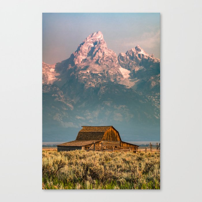 Towering Mountain Peaks Of Grand Tetons And Mormon Row Barn Canvas Print