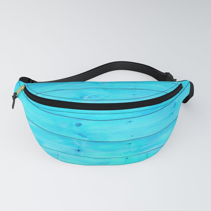 bright cyan blue distressed stained painted wood board wall Fanny Pack
