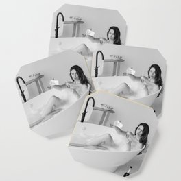 After party; young woman on her cellphone with champagne on ice in bathtub female black and white photograph - photography - photographs by Vitalik Radko Coaster