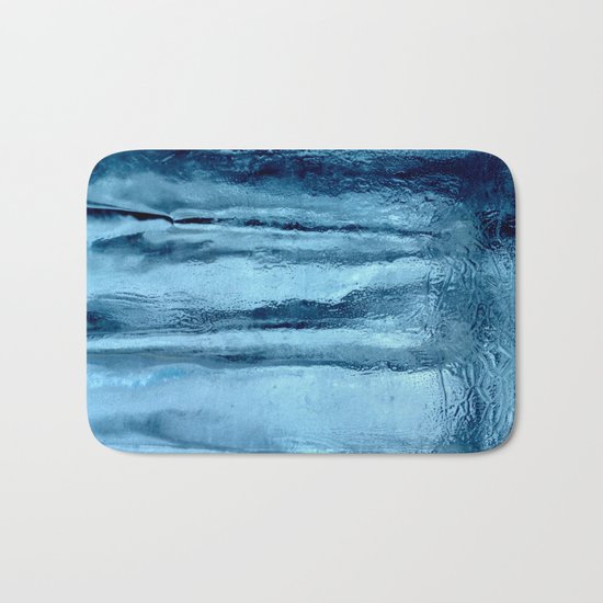 Ice with blue tonnes in a cold winter Bath Mat