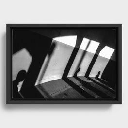 Shadows of People Framed Canvas
