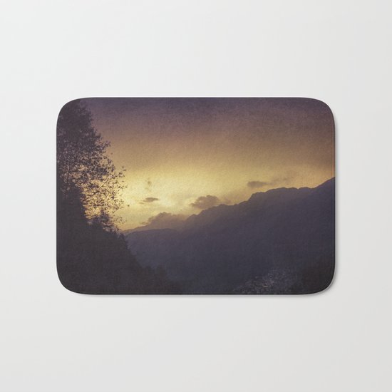 Chasing the night away Bath Mat