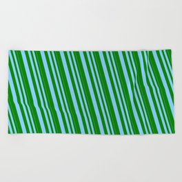 [ Thumbnail: Light Sky Blue & Green Colored Pattern of Stripes Beach Towel ]