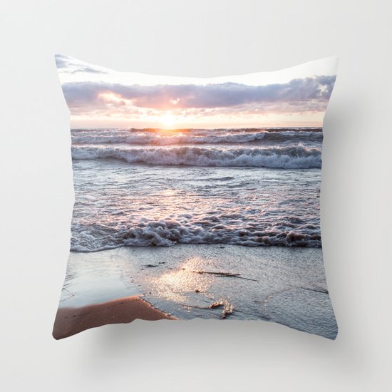 Crashing waves and a golden sunset Throw Pillow