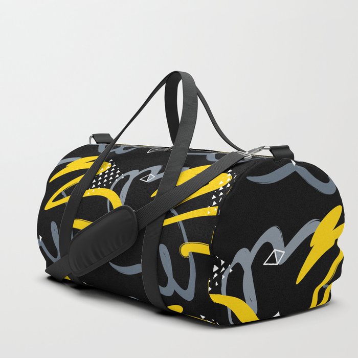 black and yellow duffle bag