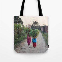 Indian women carrying grass Tote Bag