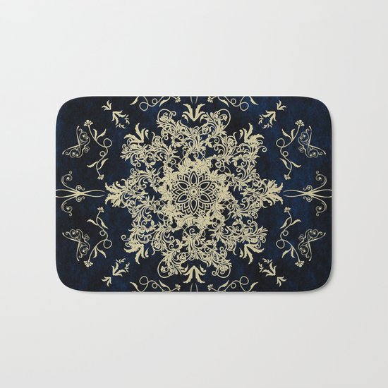 Pale Gold Floral Design On A Blue Textured Background Bath Mat