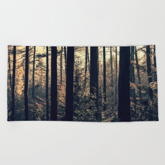 Light in the forest Beach Towel