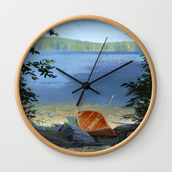 canoe on shore Wall Clock