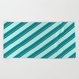 [ Thumbnail: Turquoise, Teal, Cornflower Blue & Dark Green Colored Lined Pattern Beach Towel ]