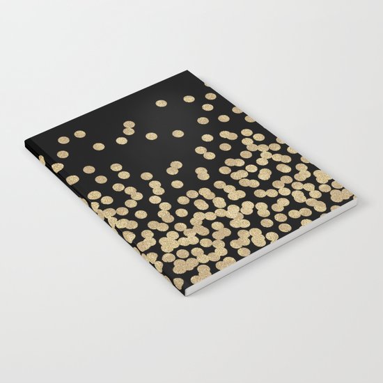 Gold glitter dots scattered on black background Notebook
