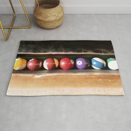 Group of vintage pool balls inside the table, closeup, retro style. Area & Throw Rug