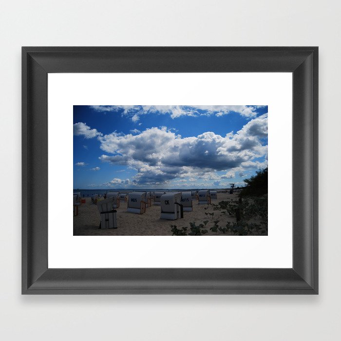 Roofed wicker beach chairs by the Baltic Sea Framed Art Print