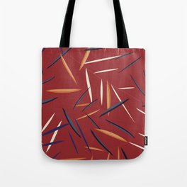 Leaves in a red background Tote Bag