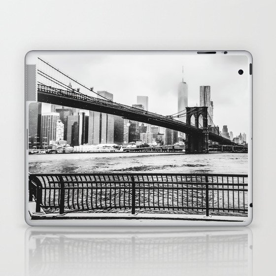 Brooklyn Bridge and Manhattan skyline during winter snowstorm in New York City black and white Laptop & iPad Skin