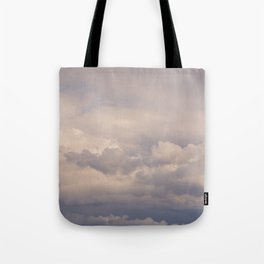 Clouds in the blue sky indicate the arrival of a disturbance Tote Bag