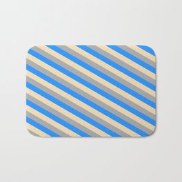 [ Thumbnail: Tan, Dark Grey, and Blue Colored Pattern of Stripes Bath Mat ]