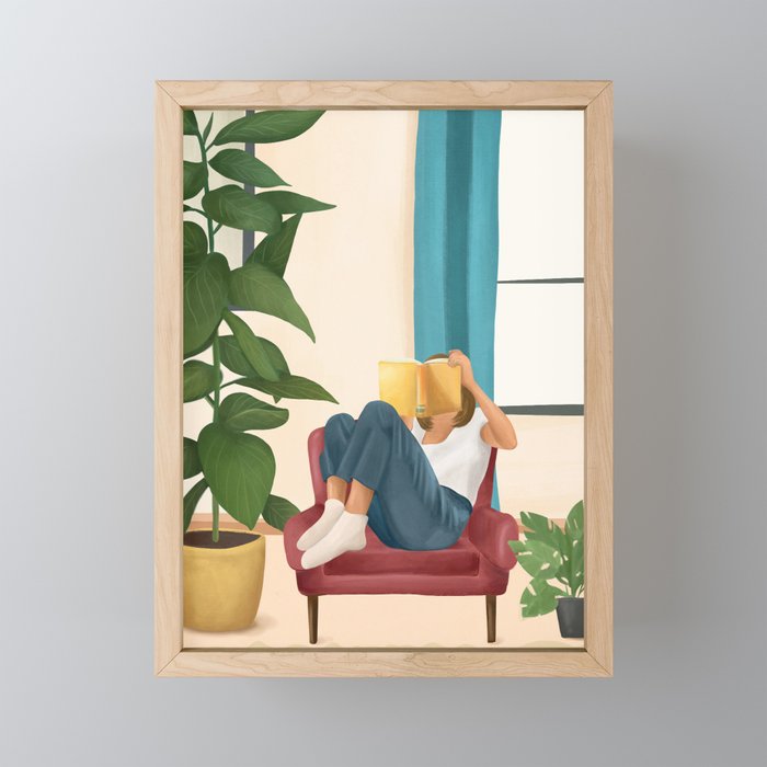 On the pages of a book Framed Mini Art Print