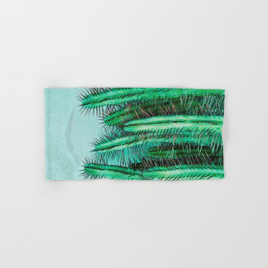 A prickly cactus on concrete Hand & Bath Towel