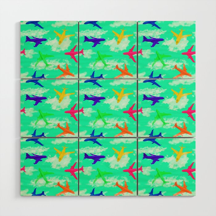 seamless pattern with multicolor airplane silhouettes Wood Wall Art
